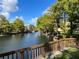 Scenic lake view with fountain and lush landscaping at 5773 Gatlin Ave # 627, Orlando, FL 32822