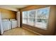 Laundry room with washer, dryer, and large window at 5773 Gatlin Ave # 627, Orlando, FL 32822