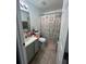 Clean bathroom with shower/tub combo and vanity at 824 San Pedro Ct, Kissimmee, FL 34758