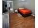Bright bedroom with wood floors and a comfortable bed at 824 San Pedro Ct, Kissimmee, FL 34758