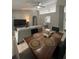 Open concept dining area with a large wooden table at 824 San Pedro Ct, Kissimmee, FL 34758