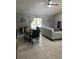 Bright dining room with large wooden table and six chairs at 824 San Pedro Ct, Kissimmee, FL 34758