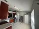 Bright kitchen with stainless steel appliances and light tile floors at 824 San Pedro Ct, Kissimmee, FL 34758