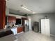 Kitchen features stainless steel appliances and ample wood cabinets at 824 San Pedro Ct, Kissimmee, FL 34758