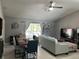 Spacious living area with sectional sofa and dining table at 824 San Pedro Ct, Kissimmee, FL 34758
