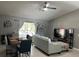 Spacious living area with sectional sofa and dining table at 824 San Pedro Ct, Kissimmee, FL 34758