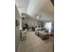 Open concept living room and dining area with tile floors at 824 San Pedro Ct, Kissimmee, FL 34758