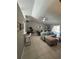 Open concept living room and dining area with tile floors at 824 San Pedro Ct, Kissimmee, FL 34758