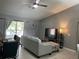 Spacious living area with sectional sofa and dining table at 824 San Pedro Ct, Kissimmee, FL 34758
