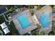 Two pools, a playground, and ample green space at 10090 Sunnifa Aly, Orlando, FL 32832