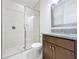 Clean bathroom, granite countertop, and glass shower at 10090 Sunnifa Aly, Orlando, FL 32832