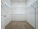 Large walk-in closet with wire shelving, providing ample storage space at 10090 Sunnifa Aly, Orlando, FL 32832