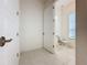Powder room with single vanity and window at 10090 Sunnifa Aly, Orlando, FL 32832