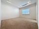 Simple bedroom with neutral walls and carpeted floor at 10090 Sunnifa Aly, Orlando, FL 32832