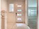 Bright entryway with modern front door and tile flooring at 10090 Sunnifa Aly, Orlando, FL 32832