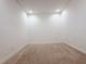 Empty bedroom with neutral walls and carpeting at 10090 Sunnifa Aly, Orlando, FL 32832
