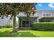 Exterior view of house with screened porch at 1060 Rock Harbor Ave, Orlando, FL 32828