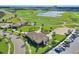 Aerial view of golf course clubhouse and parking lot at 1081 Trappers Trail Loop, Davenport, FL 33896