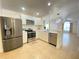 Modern kitchen with stainless steel appliances and white cabinets at 2907 Delcrest Dr, Orlando, FL 32817