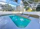 Inviting screened-in pool with tiled decking at 2907 Delcrest Dr, Orlando, FL 32817