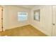 Spacious bedroom with two windows and tile floors at 2907 Delcrest Dr, Orlando, FL 32817