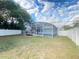 Home features a fenced backyard with a screened pool at 2907 Delcrest Dr, Orlando, FL 32817