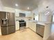 Modern kitchen with stainless steel appliances and white cabinets at 2907 Delcrest Dr, Orlando, FL 32817