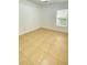 Spacious bedroom with tile floors and window at 2907 Delcrest Dr, Orlando, FL 32817
