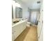 Clean bathroom with shower stall and double vanity at 2907 Delcrest Dr, Orlando, FL 32817