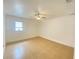 Spacious bedroom with tile floors and a ceiling fan at 2907 Delcrest Dr, Orlando, FL 32817