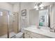 Bathroom with shower, toilet and vanity with a quartz countertop at 3075 Key Lime Loop, Kissimmee, FL 34747