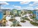 Brightly colored homes surround a playground in a community setting at 3075 Key Lime Loop, Kissimmee, FL 34747