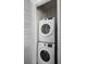 Stackable Samsung washer and dryer in a closet at 3075 Key Lime Loop, Kissimmee, FL 34747