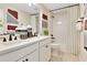 Clean bathroom with double vanity and a shower/tub combo at 3740 Deer Ridge Dr, Mount Dora, FL 32757