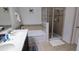 Double vanity, garden tub, and a separate shower at 468 Andalusia Loop, Davenport, FL 33837