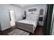 King-size bed, ample closet space, and en-suite bathroom at 468 Andalusia Loop, Davenport, FL 33837