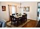 Elegant dining room with hardwood floors and a chandelier at 468 Andalusia Loop, Davenport, FL 33837