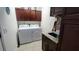 Convenient laundry room with washer, dryer, and cabinets at 468 Andalusia Loop, Davenport, FL 33837