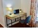 Home office with a desk, chair, and laptop at 468 Andalusia Loop, Davenport, FL 33837