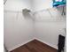 Bright walk-in closet with wire shelving and wood flooring at 468 Andalusia Loop, Davenport, FL 33837