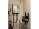 Small utility closet with a tankless water heater and a vacuum cleaner at 5140 Conroy Rd # 38, Orlando, FL 32811