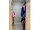 Large walk-in closet with plenty of shelving and hanging space at 5140 Conroy Rd # 38, Orlando, FL 32811