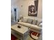 Comfortable living room with large sofa and coffee table at 5140 Conroy Rd # 38, Orlando, FL 32811