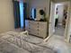 Cozy bedroom with ample closet space and a full-size bed at 5140 Conroy Rd # 38, Orlando, FL 32811