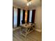 Bright home office features a large desk and plenty of natural light at 5140 Conroy Rd # 38, Orlando, FL 32811