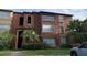 Two-story building with Mediterranean-style architecture at 5140 Conroy Rd # 38, Orlando, FL 32811