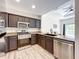 Modern kitchen with stainless steel appliances and granite countertops at 7510 Seven Eagles Way # 7510, Reunion, FL 34747