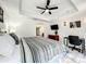 Spacious bedroom with king-size bed and built-in workspace at 7510 Seven Eagles Way # 7510, Reunion, FL 34747