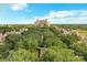 Aerial view of community with resort-style amenities and lush landscaping at 7510 Seven Eagles Way # 7510, Reunion, FL 34747