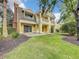 Charming two-story home with landscaped yard and stone patio at 7510 Seven Eagles Way # 7510, Reunion, FL 34747